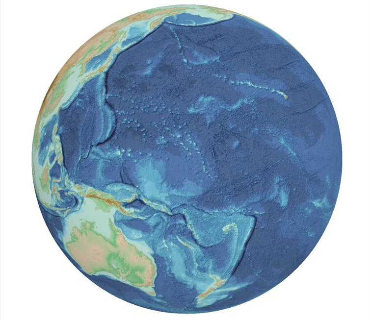 An image of the western half of the Pacific Ocean, showing sea floor depths in different shades of blue.
