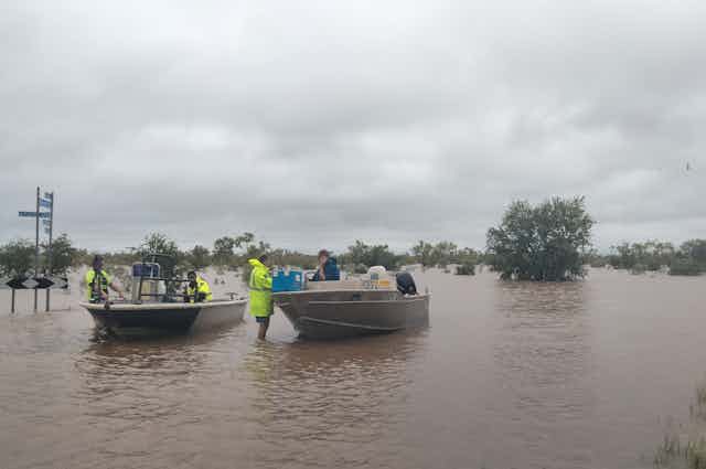 Two emergency rescue boats on floodwaters in the Kimberley