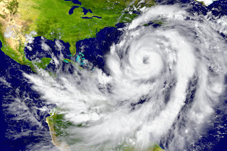 A map showing a large hurricane building off the east coast of the USA.
