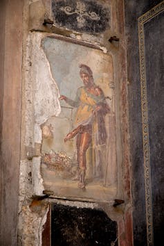The god Priapus is shown wearing a tunic that doesn't contain his cartoonishly large penis.