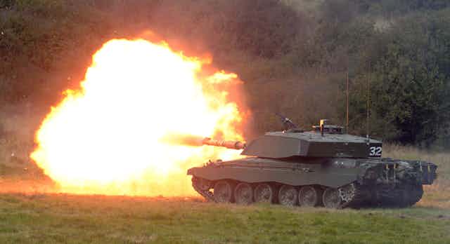 Challenger 2 tank fires a shell