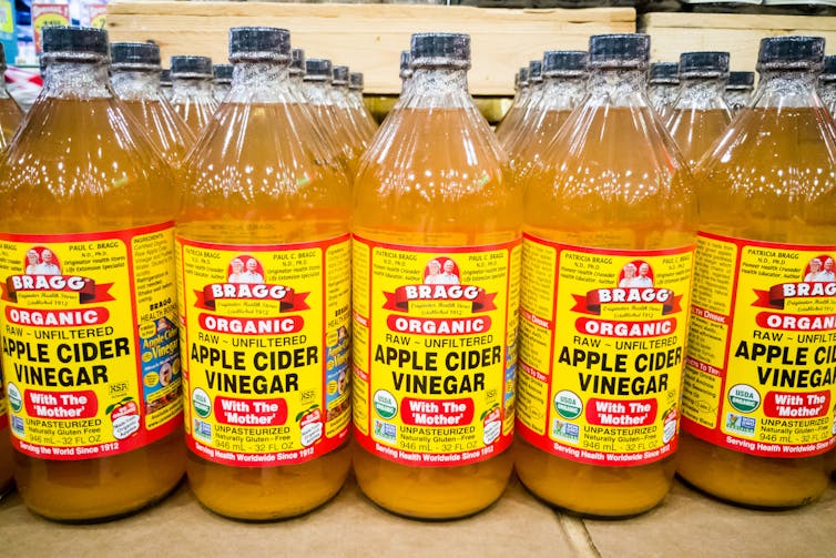 Bottles of apple cider vinegar