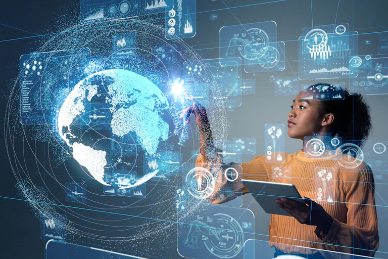 A woman, holding a tablet, reaches out to touch a holographic image of the earth surrounded by floating images of graphs and diagrams.