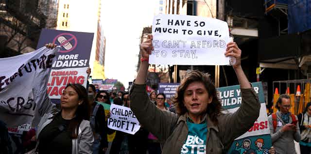 Childcare educators and workers participate in a rally, calling on the government for better pay and conditions, in Sydney, Wednesday, September 7, 2022.