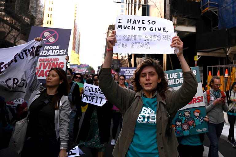 Childcare educators and workers participate in a rally, calling on the government for better pay and conditions, in Sydney, Wednesday, September 7, 2022.