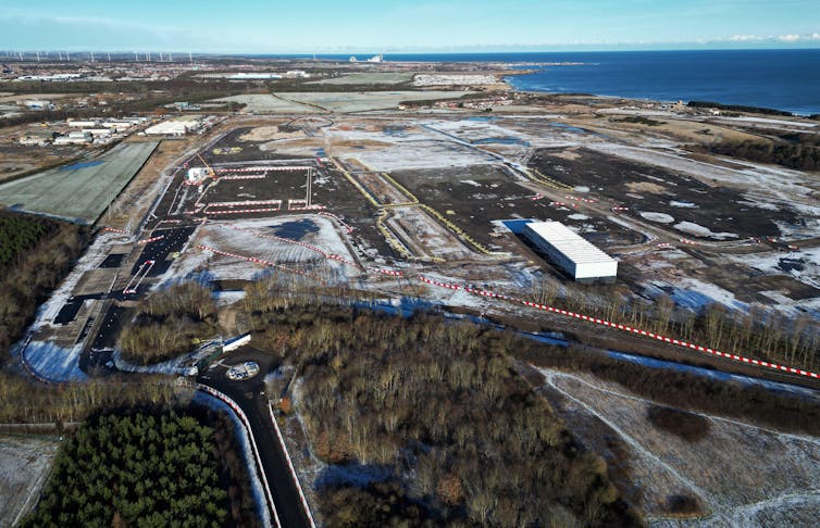 An aerial view of a vacant industrial site.