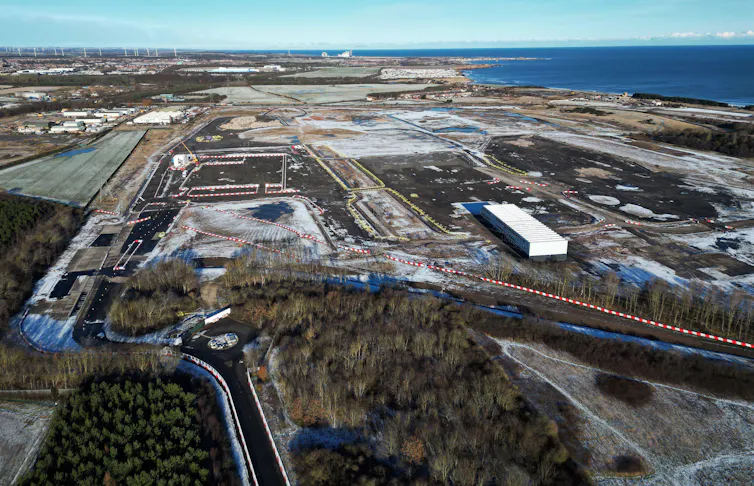 An aerial view of a vacant industrial site.