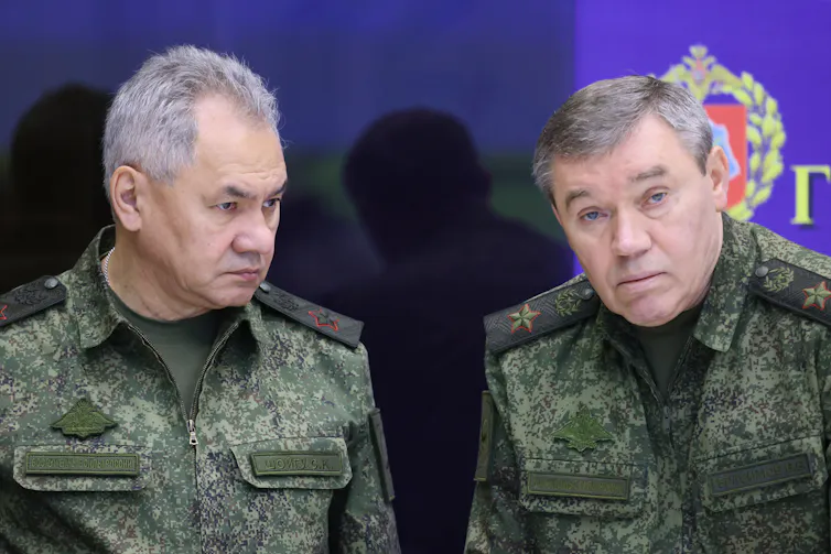 Two senior Russian military officers stand together.