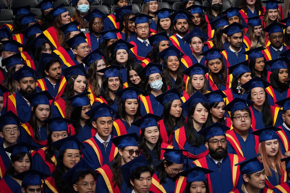 A group of people in graduation robes.