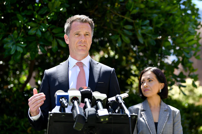 NSW Labor leader Chris Minns at a press conference with shadow education minister Prue Car