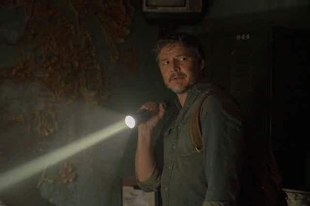 A photo of Pedro Pascal acting in a scene from The Last of Us TV show.