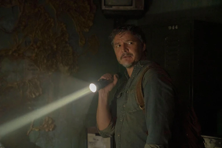 A photo of Pedro Pascal acting in a scene from The Last of Us TV show.