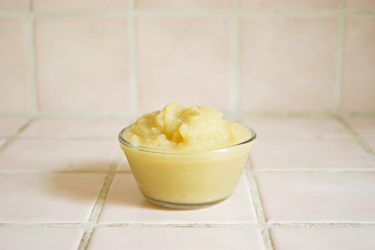 bowl of applesauce on benchtop