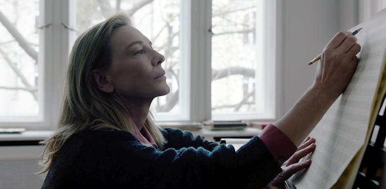 Blanchett as Tar annotating sheet music