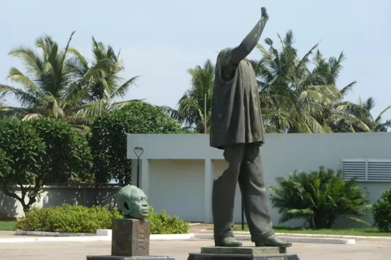 Broken statue of a man