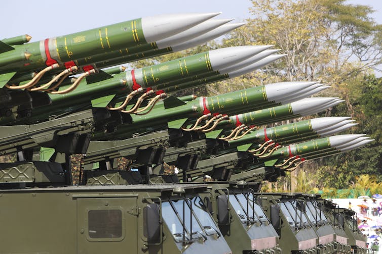 Military trucks loaded with missiles