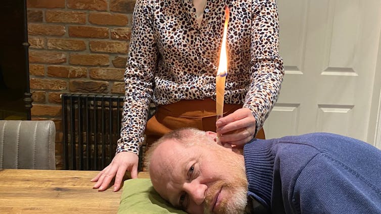 The author, Kevin Munro, trying Hopi ear candles.