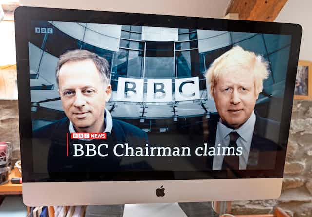 A screenshot from BBC news whosing BBC chairman Richard Sharp and former prime minister Boris Johnson outside Broadcasting House
