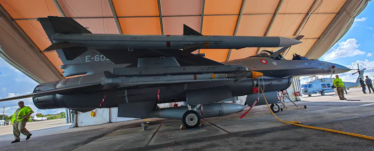 A US_made F-16 fighter operated by the Danish air force in a hanger in Bornholm, Denmark, September 2022.
