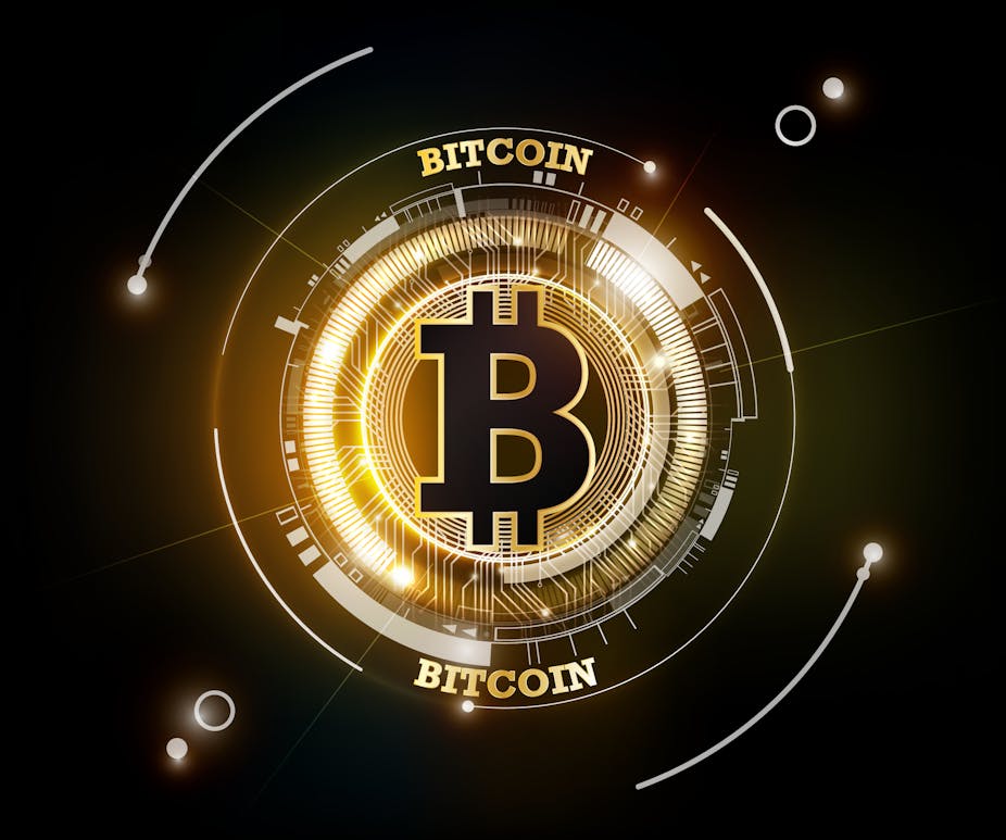 A bitcoin logo in gold