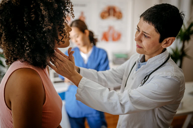 Female doctor doing a medical examination.
