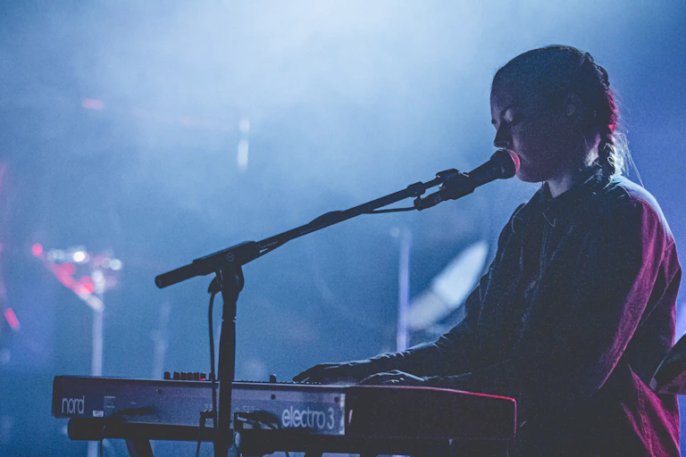 A woman at a keyboard