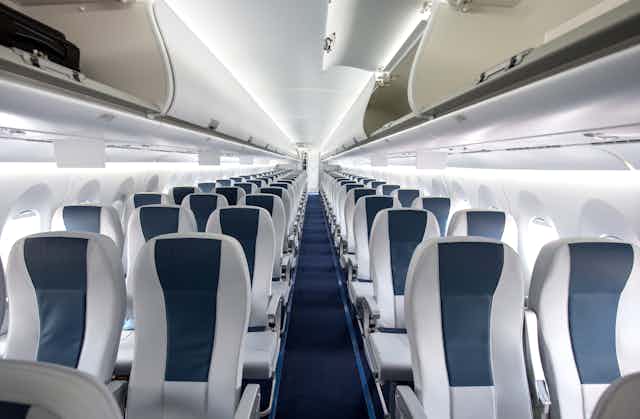 Inside view of empty seat in a plane cabin