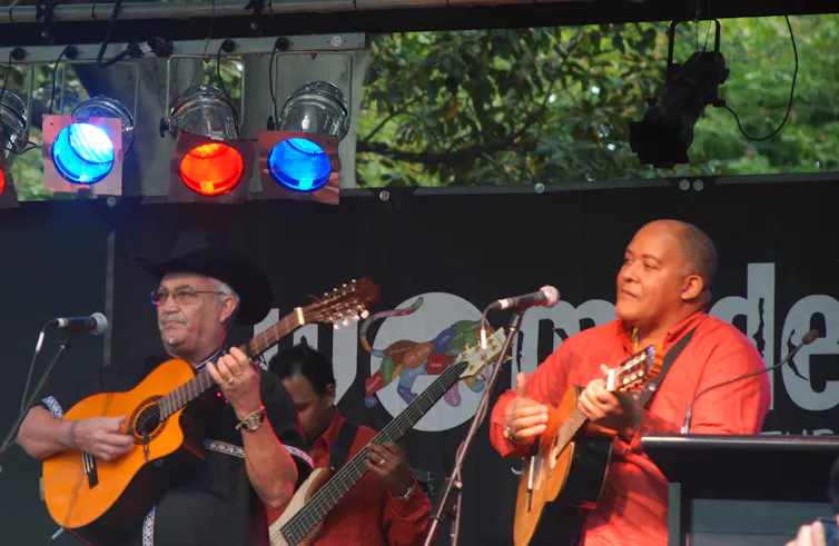 Two musicians on stage.