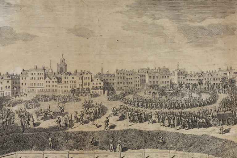 A historic etching depicting a cityscape with crowds.