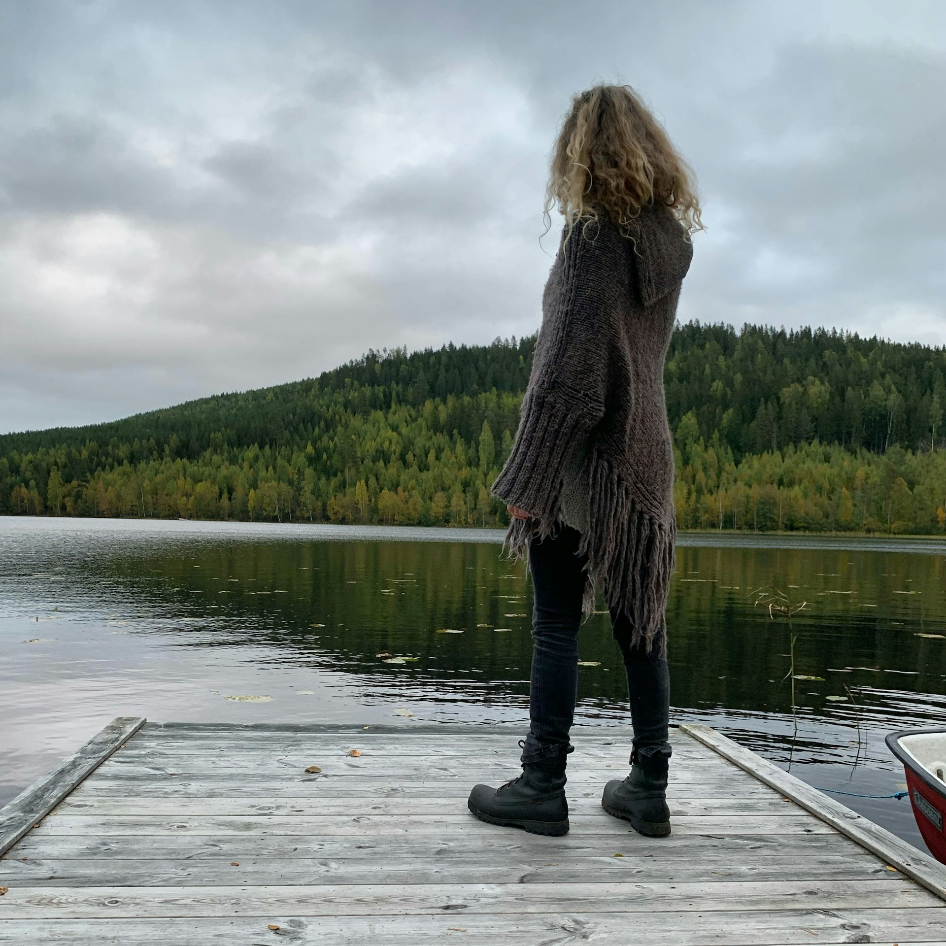 Woman by a lake.