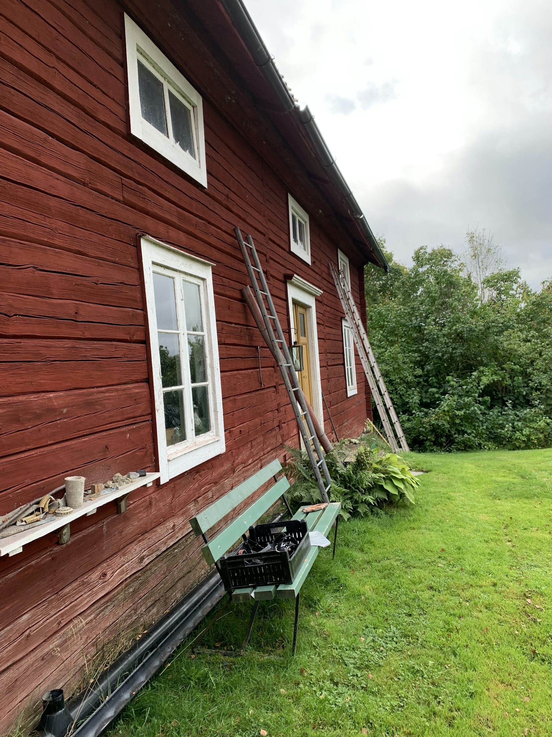 A wooden house painted red.