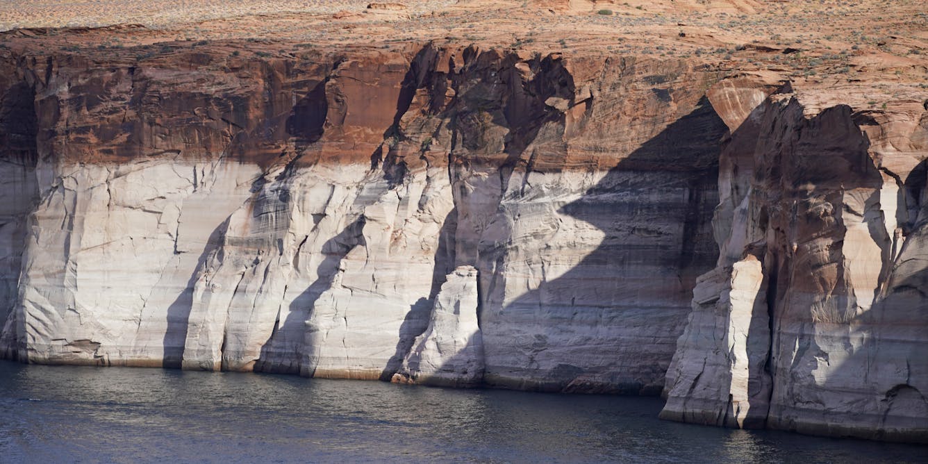 As climate change and overuse shrink Lake Powell, the emergent landscape is coming back to life – and posing newchallenges