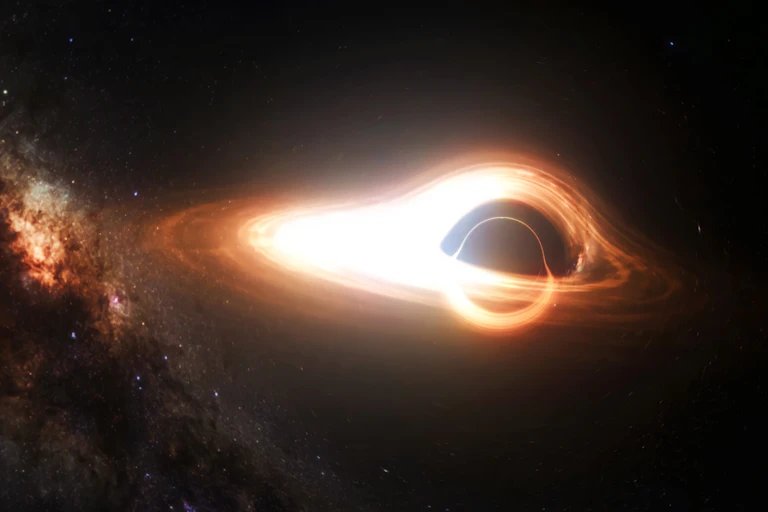 A model of a black hole with a dark centre and a donut like glowing ring around