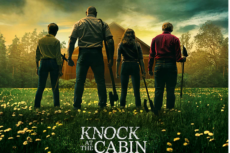 Movie poster showing a family standing in front of a cabin
