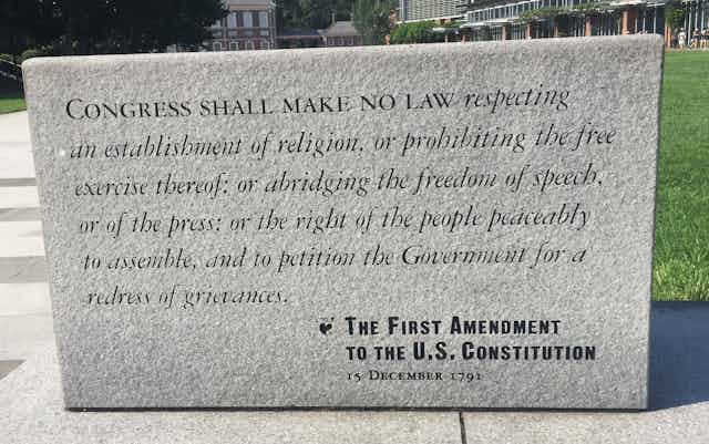A stone marker bearing the full text of the First Amendment to the U.S. Constitution
