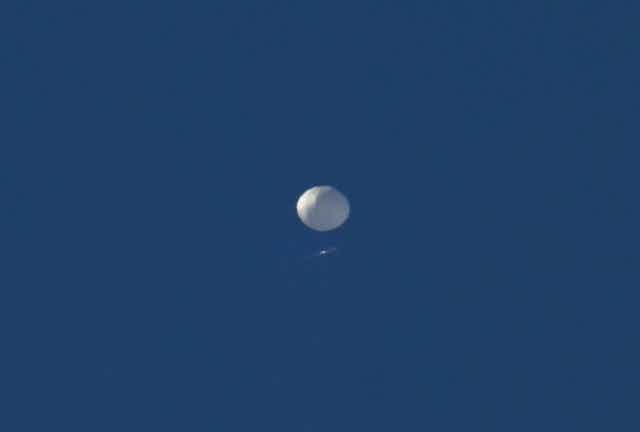  A white sphere against a clear blue sky