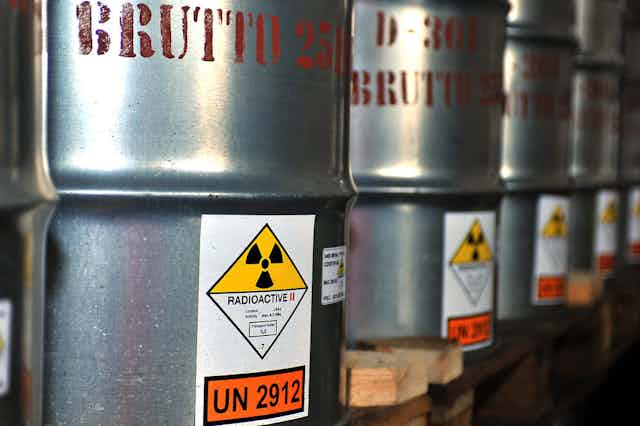 Uranium ore in barrels