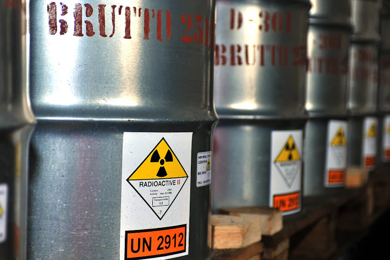 Uranium ore in barrels