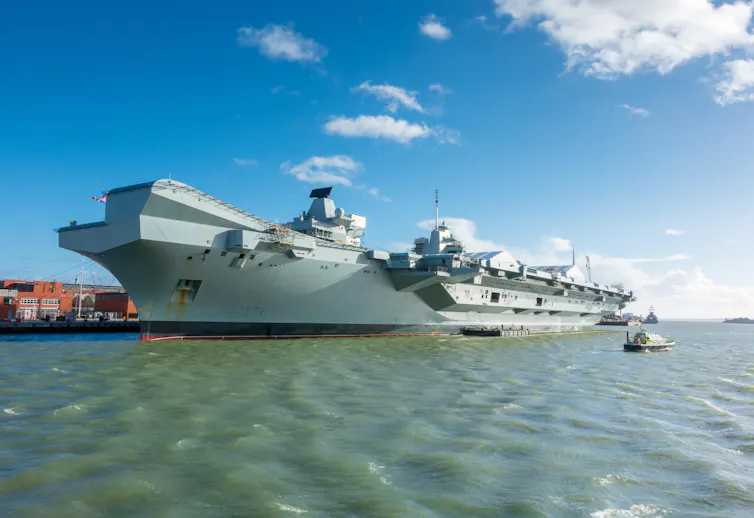 Queen Elizabeth aircraft carrier docked at Portsmouth