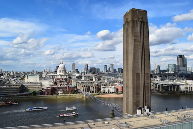 A view over London from the roof of a building.