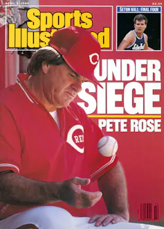 Magazine cover featuring baseball coach in red uniform looking dejected.