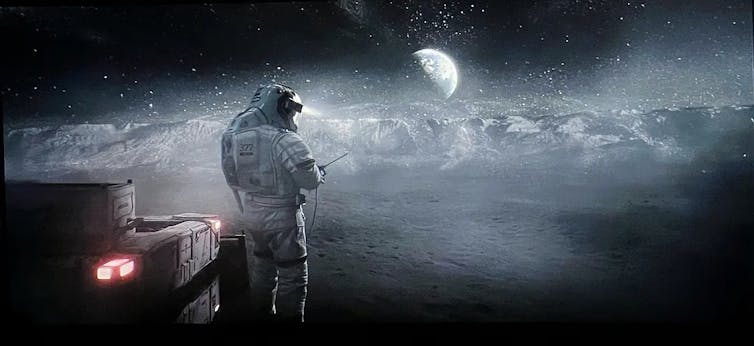 An astronaut stands on the moon