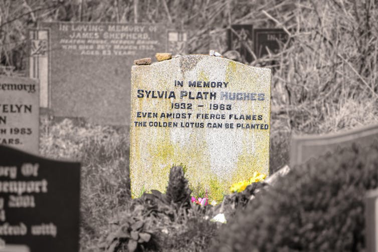 Sylvia Plath's grave in Heptonstall, West Yorkshire. Inscription reads, 'Even amidst fierce flames, the golden lotus can be planted'