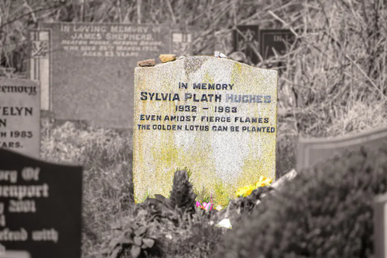 Sylvia Plath's grave in Heptonstall, West Yorkshire. Inscription reads, 'Even amidst fierce flames, the golden lotus can be planted'