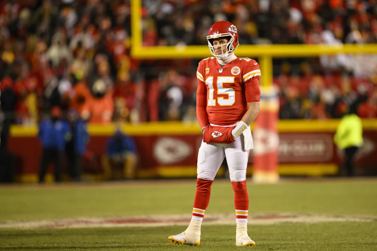 A football player standing on a field.