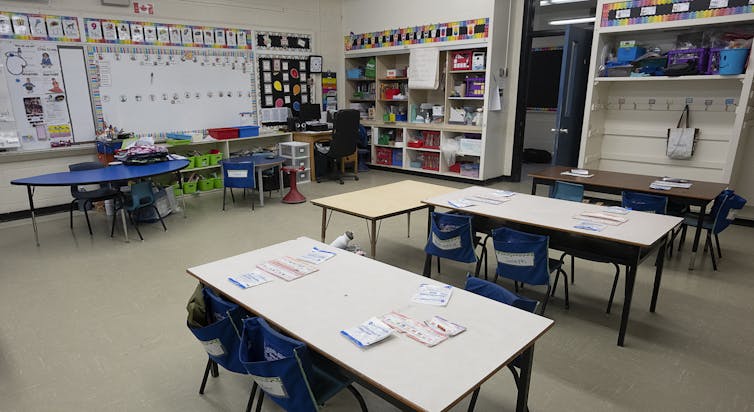 A classroom with tables.