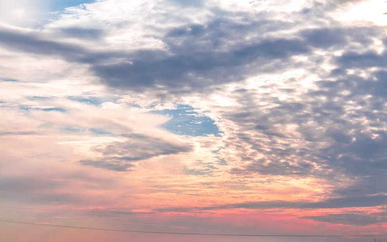 A photo of wispy clouds.