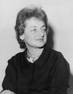 Black and white photograph of Betty Friedan wearing a black jumper, her hair short.