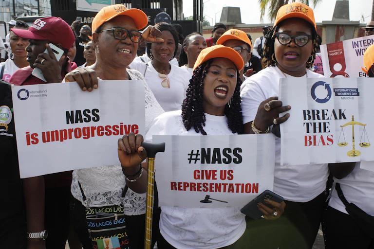Women holding placards during a protest