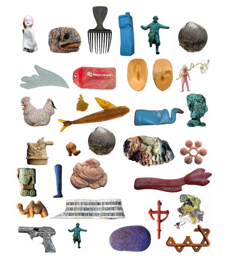 Array of plastic objects, including toys, action figures and fragments of larger objects.